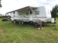 2006 Puma 30 ft pull trailer with Rear bunk