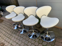 Set of 4 white swivel adjustable height stools