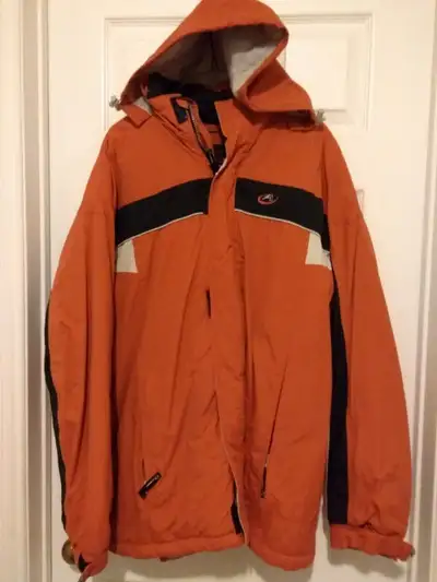 Gently used Winter Jacket with hood for a youth in Large size, from a Pet Free & Smoke Free home.