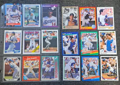 Selling 18 collectible Mike Scioscia baseball cards in good condition comes with album sleeve please...