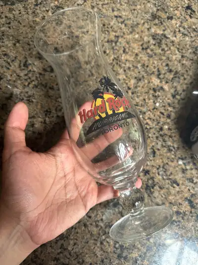 This Hard Rock Cafe Toronto hurricane glass is in good, pre-loved condition and ready to bring a tou...