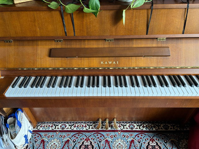 Kawai with original bench. in Pianos & Keyboards in Napanee