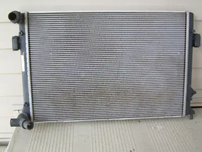 The Volkswagen radiator part number 1K0121253K is a genuine radiator assembly for various Volkswagen...