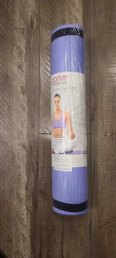 This is a new Zone Training yoga mat, extra thick at 6mm for comfortable exercise. It's still in its...