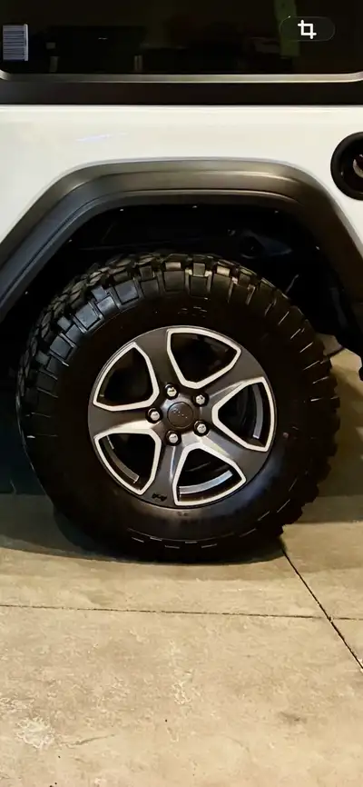 2023 jeep wrangler wheels with newer BF Goodrich Mud Terrain T/A. 255/75/17 Perfect condition. Tire...