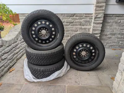 These Winter Edge(2) / Artic Claw(2) Mix brand winter tires 225 / 50R17 used on a Mitsubishi Lancer...