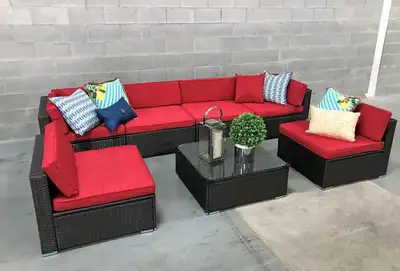 Upgrade your outdoor living space with this stylish 7-piece sectional conversation set, featuring a...