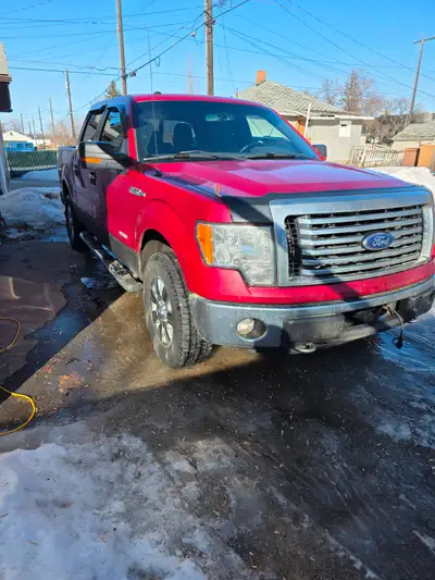 2011 ford150 xlt,2"lift ,engine 3.5l v6. engine light is clearedafter picture was taken.to view you...
