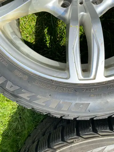 Selling snow tires and rims. 225/50R17