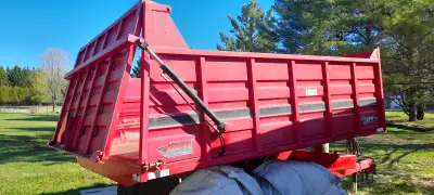 6 year old dump trailer, tractor pull, barely used, like new, has flotation tires and hydrolic lift...