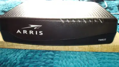 Arris TM822G - DOCSIS 3.0 8x4 Telephony Cable Modem, View more