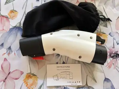 Nice brand new Tesla to J1772 adaptor for EV