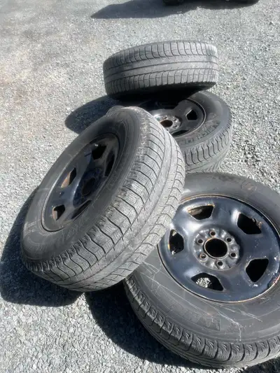 Michelin X-Ice tires. Bolt pattern matches F-150 (2015+) - tires have 1-2 seasons left of driving 20...
