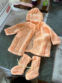 Crocheted baby homecoming outfits
