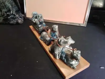 Eskimo Soapstone Carving - Dog Sled Team Unique soapstone carving depicting an Inuit dog sled team....