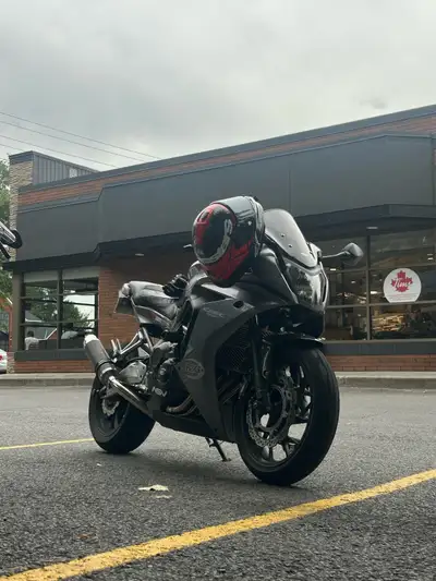 2014 Honda Cbr650f With a few mods Asv short levers Domino grips Carbon fiber front and back fenders...