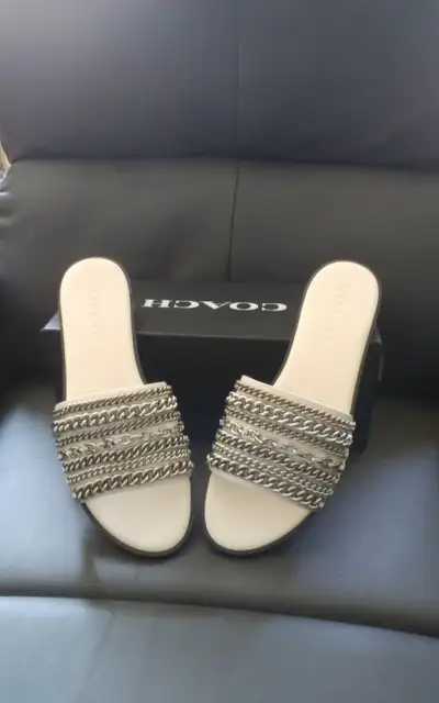 Coach Hayden Chain Mixed Metal Sandals. White Size 9.5 (slim fit) Brand new and never worn. Still in...