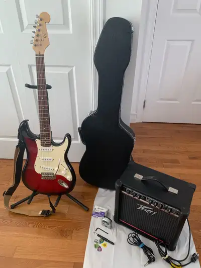 GK Stratocaster Electric Guitar and Peavey Blazer 158 Guitar Amp, View more