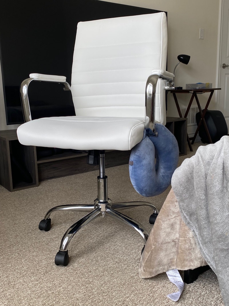 New White leather study chair with comfortable cushioning, sting