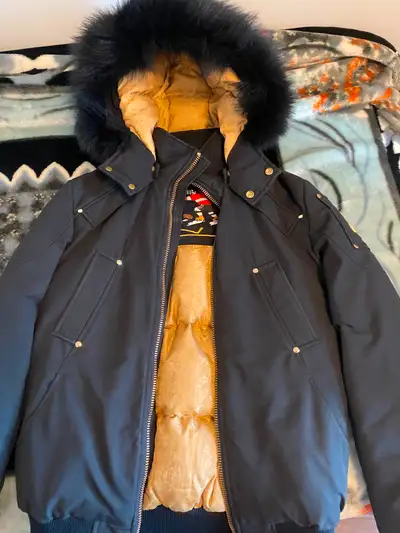 The jacket is used; it’s in excellent condition. The size is medium; accepting cash payments only.