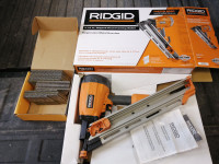 Rigid framing nailer and 60% full box of nails