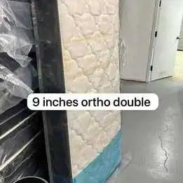 This is a brand new 9-inch thick ortho double mattress, perfect for a comfortable and supportive sle...