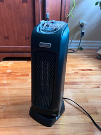 Sunbeam oscillating ceramic heater with thermostat ,5 level temp