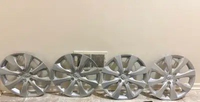 These four genuine Toyota hubcaps are in good, pre-owned condition and ready to refresh the look of...