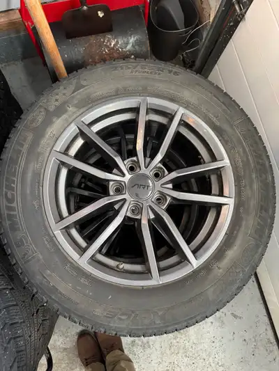 Michelin X ice 215/65r/16 winter tires on alloy wheels. Bolt pattern 5x112. Good condition alloys Ti...