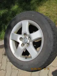 Four Toyota Aluminum Rims with Michelin one-year all-season tire