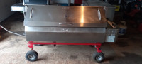 Fully automated pig roaster rental