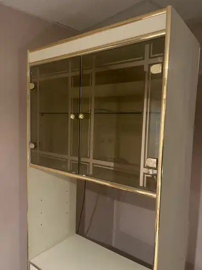 Good condition. There is a light inside. 71 inches tall 30 inches wide 15 inches deep