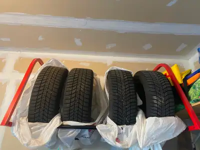 Selling a set of winter tires mounted on steel wheels. Lightly used for 2 winters. Lots of tread lef...
