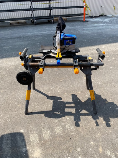 Sliding compound miter saw and stand. $150. The saw is made by Mastercraft. I think the stand is a P...