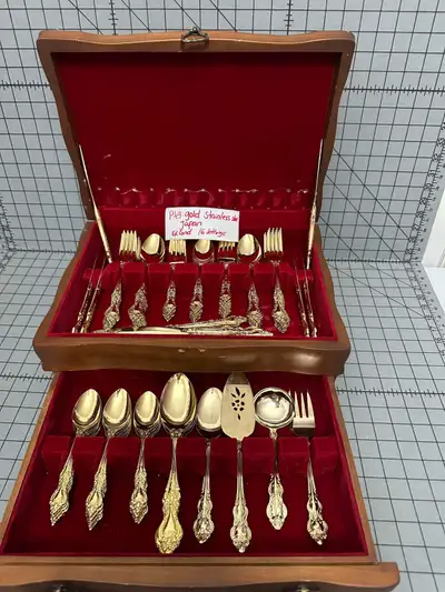 14 place settings ( 70 pieces) vintage 24k gold plated Flatware set for 14 persons. Brand new condit...