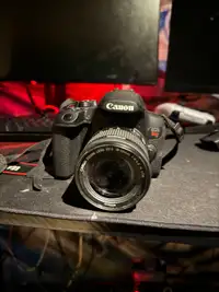 Canon Rebel T8i + 55mm Lens + Neck Strap + Lens Cover + Sd card