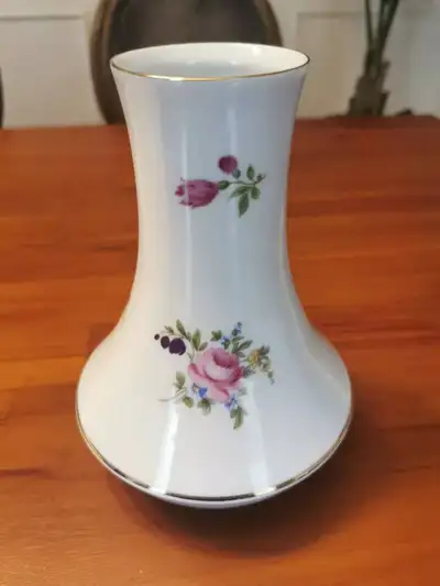 7 3/4” Tall, and made in German Democratic Republic.