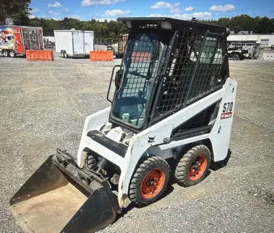 2017 Bobcat S70 Skid Steer Loader 299 original hours Features Enclosed Cab, Tier 4, Solid Tires, Man...