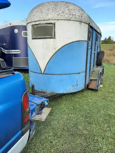 For Sale Older tag along ramp load 2 horse trailer. New wiring, lights works, center divider movable...