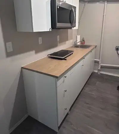 This cozy basement room is available for rent and offers a comfortable living space. The unit featur...