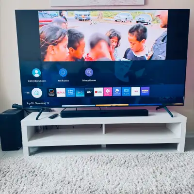 Samsung Smart 75 incTV LG wireless speaker and TV stand, View more