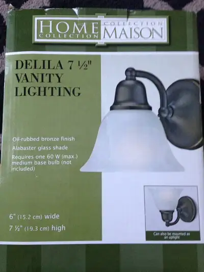 Light fixture, vanity Canvas, Delia vanity light fixture Bronze finish Dimensions: 6x7" (15x17cm) Ne...
