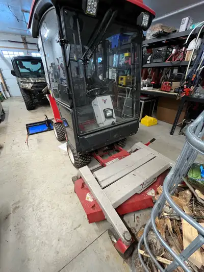 4 Wheel drive, heated cab, comes with plow, snowblower and mower deck. Back side window needs to be...