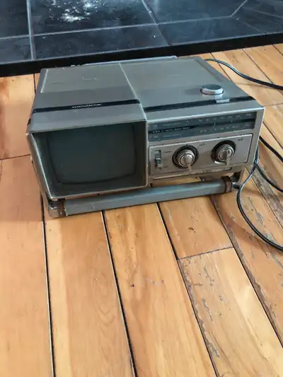 Vintage portable tv/radio runs on batteries and household power, View more