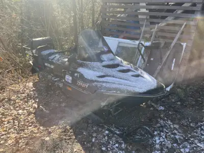 Needs battery, was running last winter intermittently, missing electric starter pull start only. For...