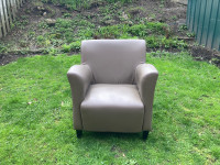 Cushioned leather arm chair