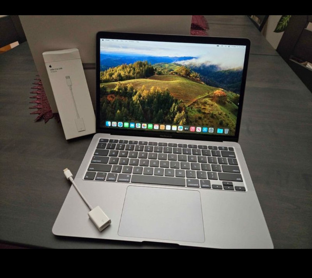 Mackbook Air 1.1 GHz Intel Core i5 with USB port - NEW read in Laptops in City of Toronto