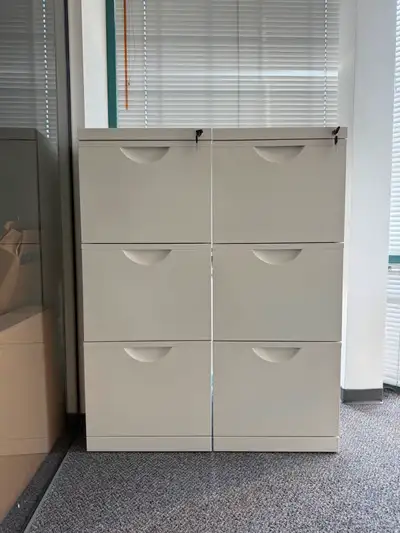 Two of Ikea's Erik Filing Cabinets in white. 41 cm x 51 cm x 104 cm. A key comes with each cabinet....