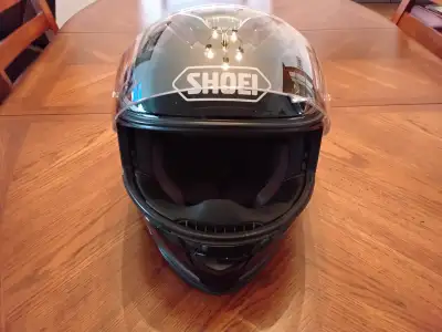 Used Shoei XXL. Has ratchet strap, built in sun visor and comes with brand new pinlock visor, helmet...