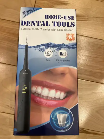 Electric Teeth Cleaner Dental Tool. Brand new, never been used. Received as present, not needed.